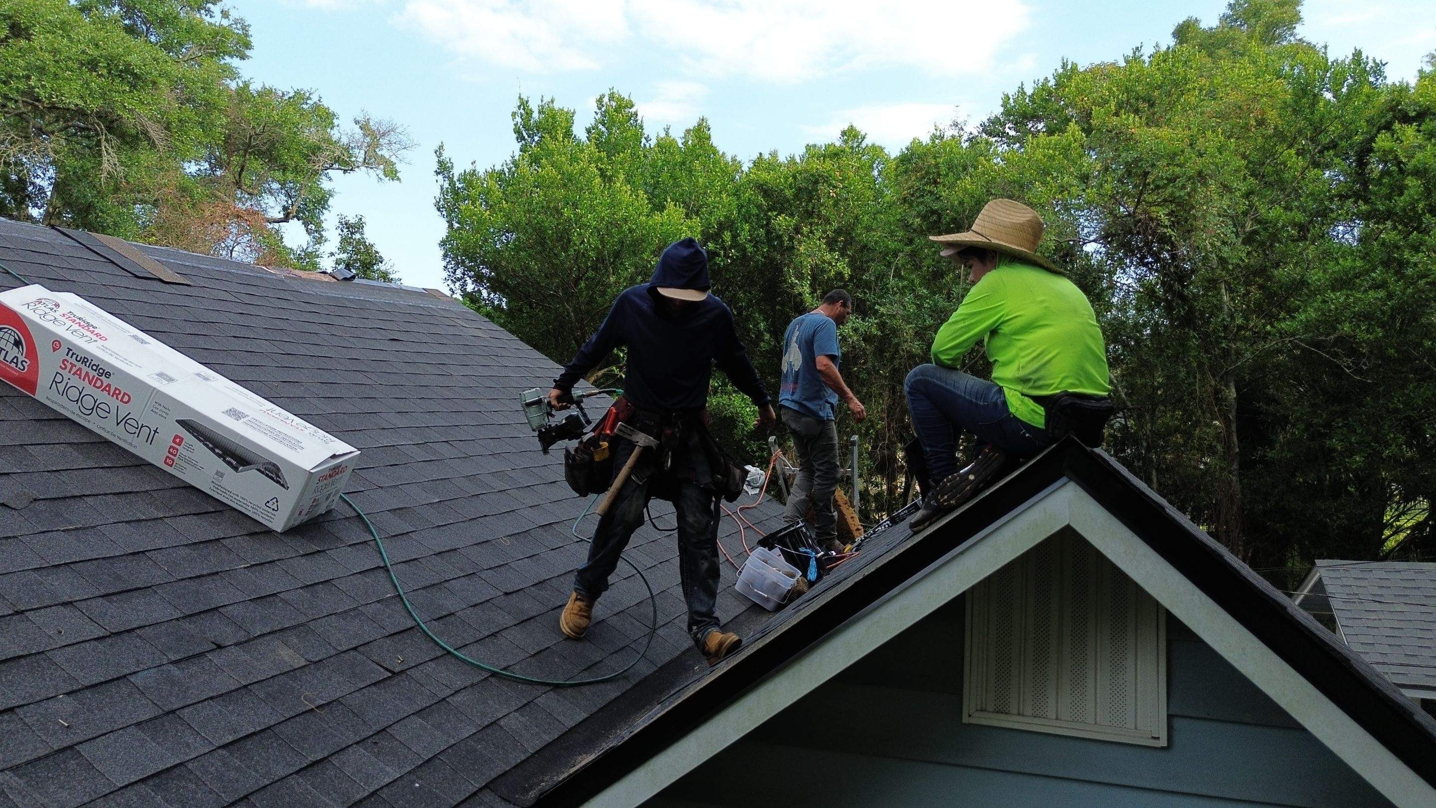 Omni Roof Systems crew at work on a residential roof