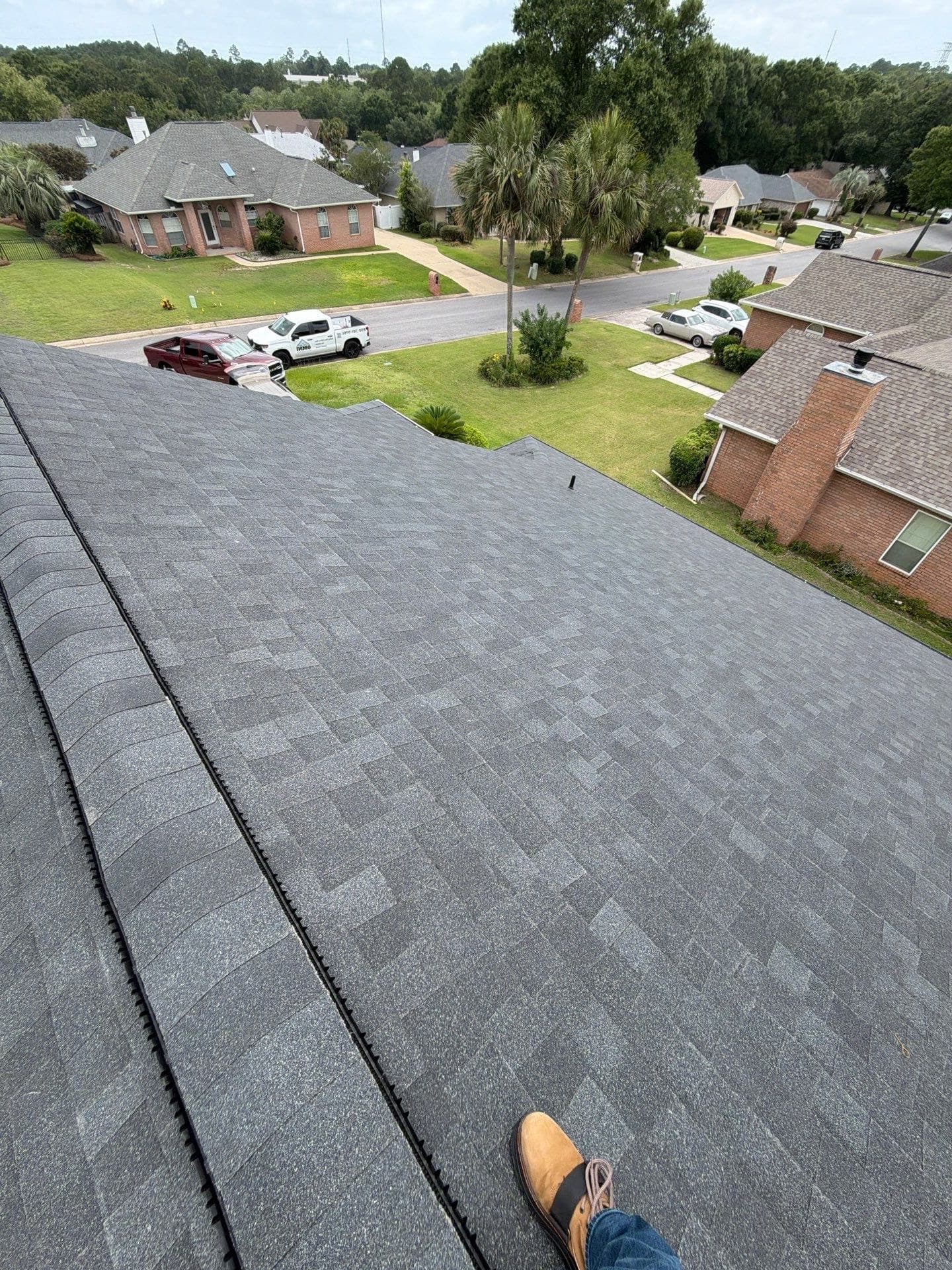Completed shingle roof with a vented ridge